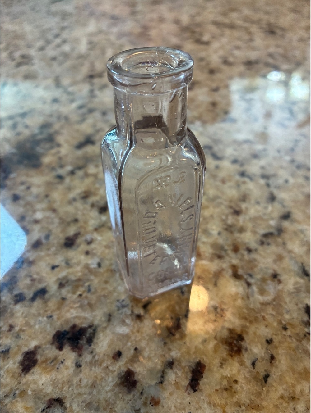 Vintage clear glass bottle